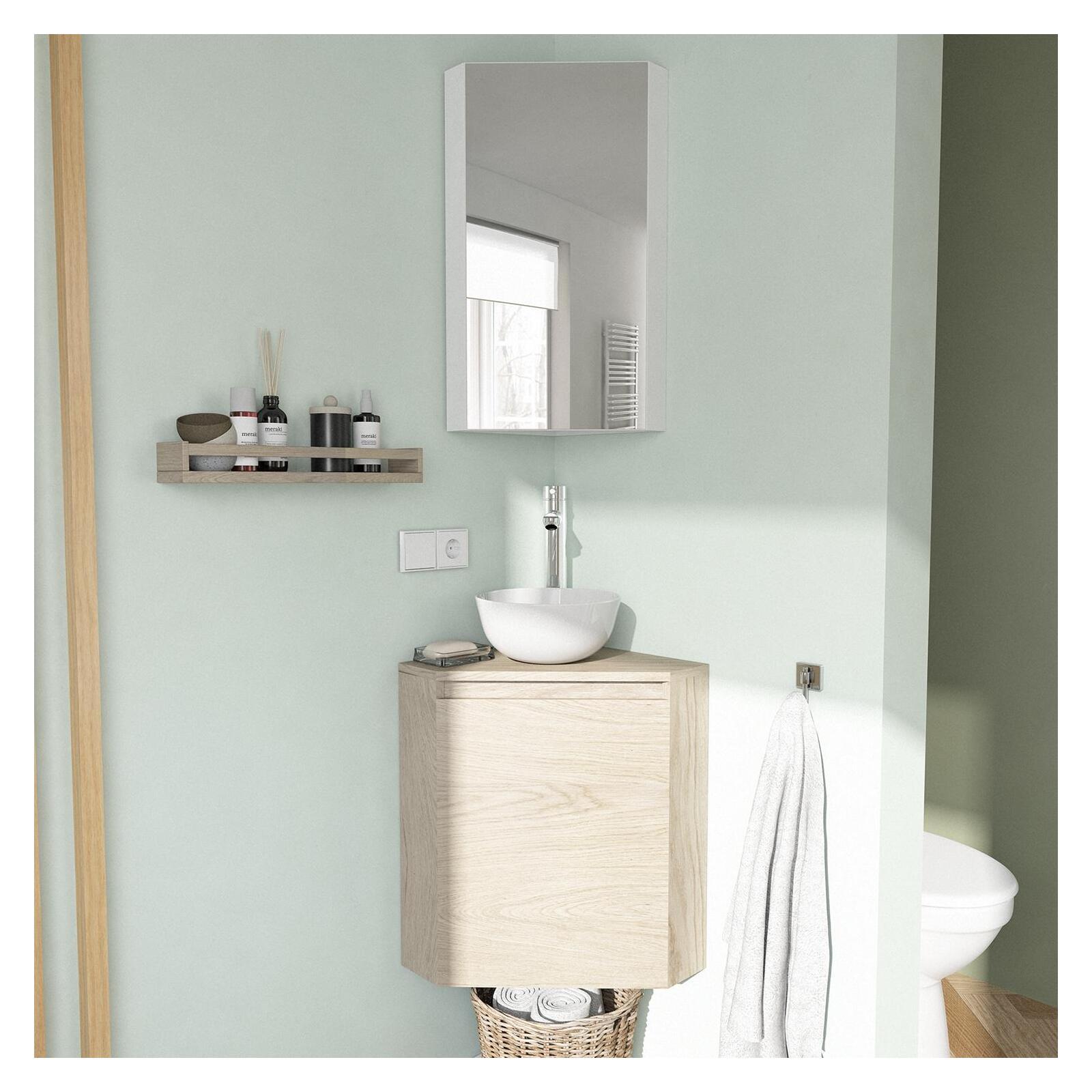Petit lavabo d'angle WC avec meuble suspendu au mur