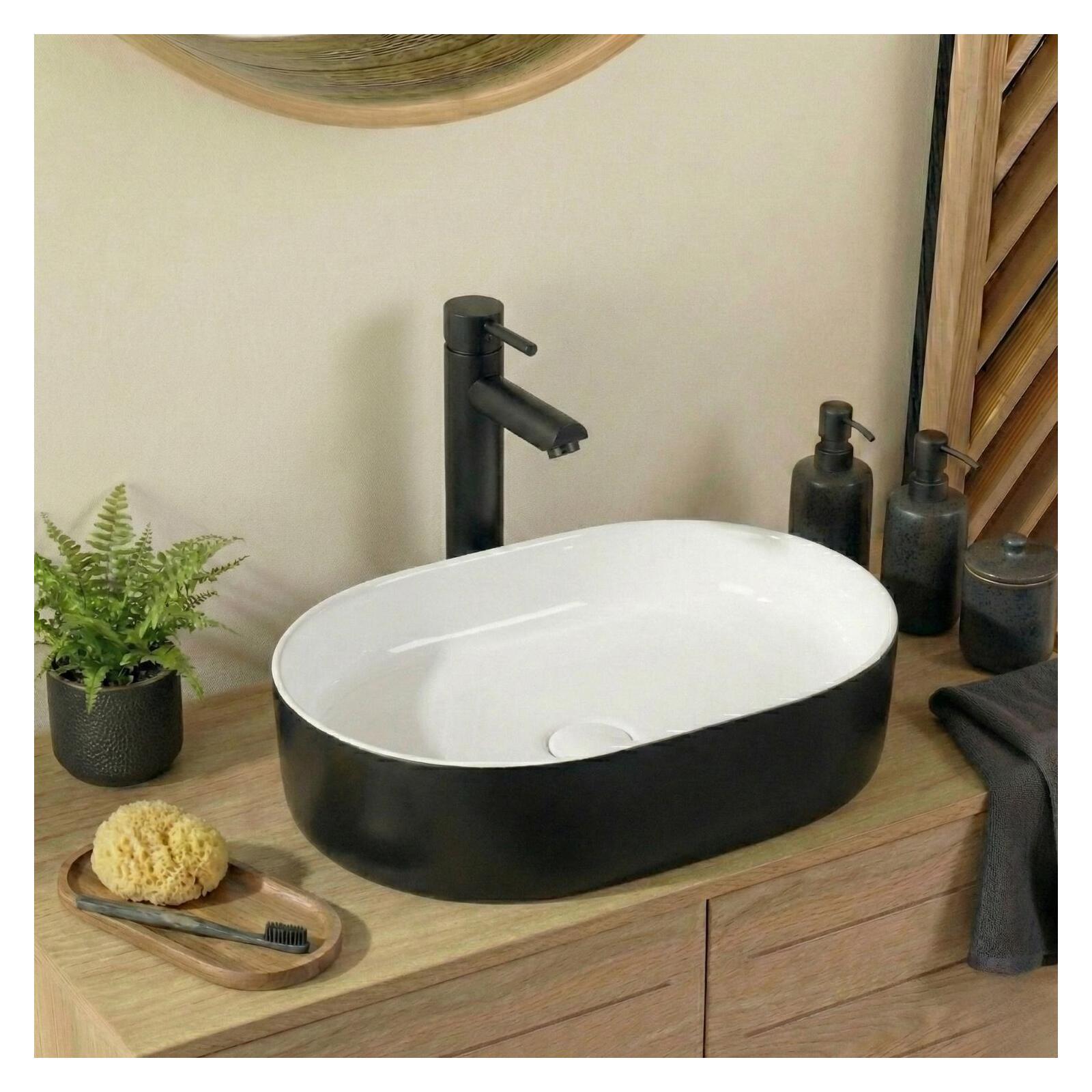 Vasque à poser ovale en céramique bicolore noire et blanche 50x37cm