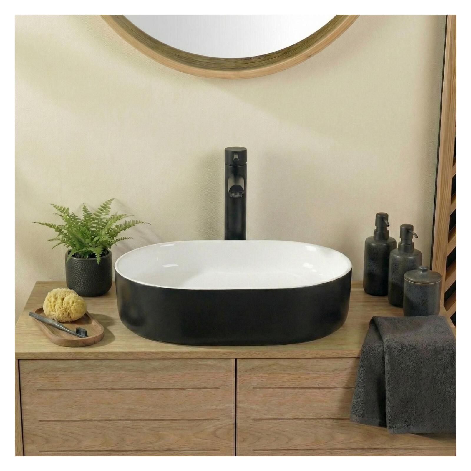 Vasque à poser ovale en céramique bicolore noire et blanche 50x37cm