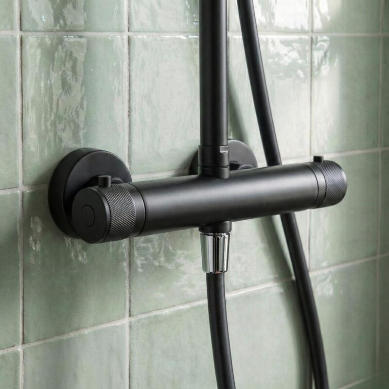 Colonne de douche thermostatique en inox avec tête ronde et poignées guillochées